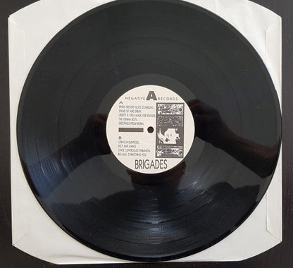 The Brigades : Yours Negatively (LP, Album + 7")